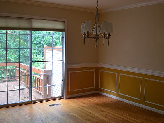 dining room with walkout to private deck