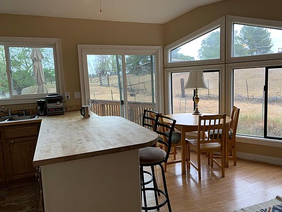 eat in portion of kitchen with slider to private deck
