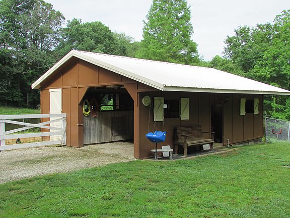 Two stall barn w/carport