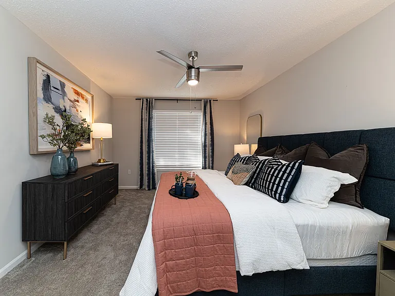 Cozy bedroom suite with carpet