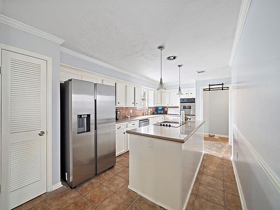 5th image of 4814 Whispering Falls Drive