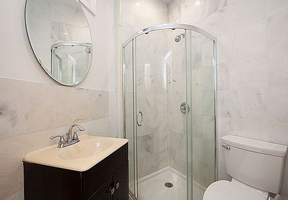 5th image of 215 E 10th St APT 6