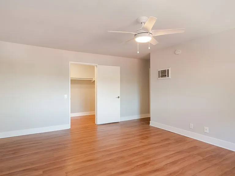 Relax and unwind in your private bedroom equipped with ceiling fan