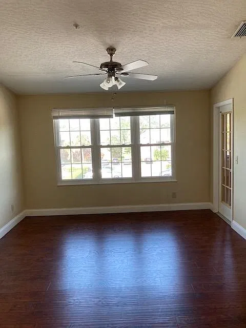 7667 N Wickham Rd — Photo 2