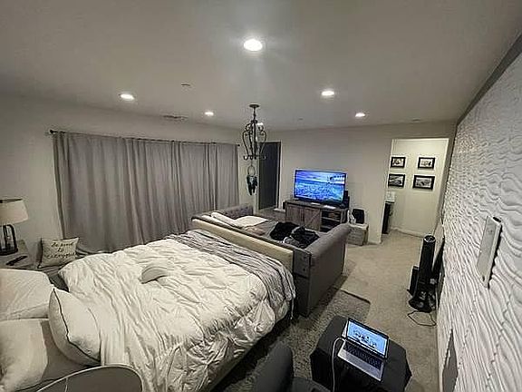 Large Master Bedroom w/ 9_ Doors.