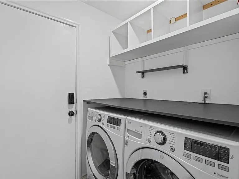 laundry room off the garage and living room