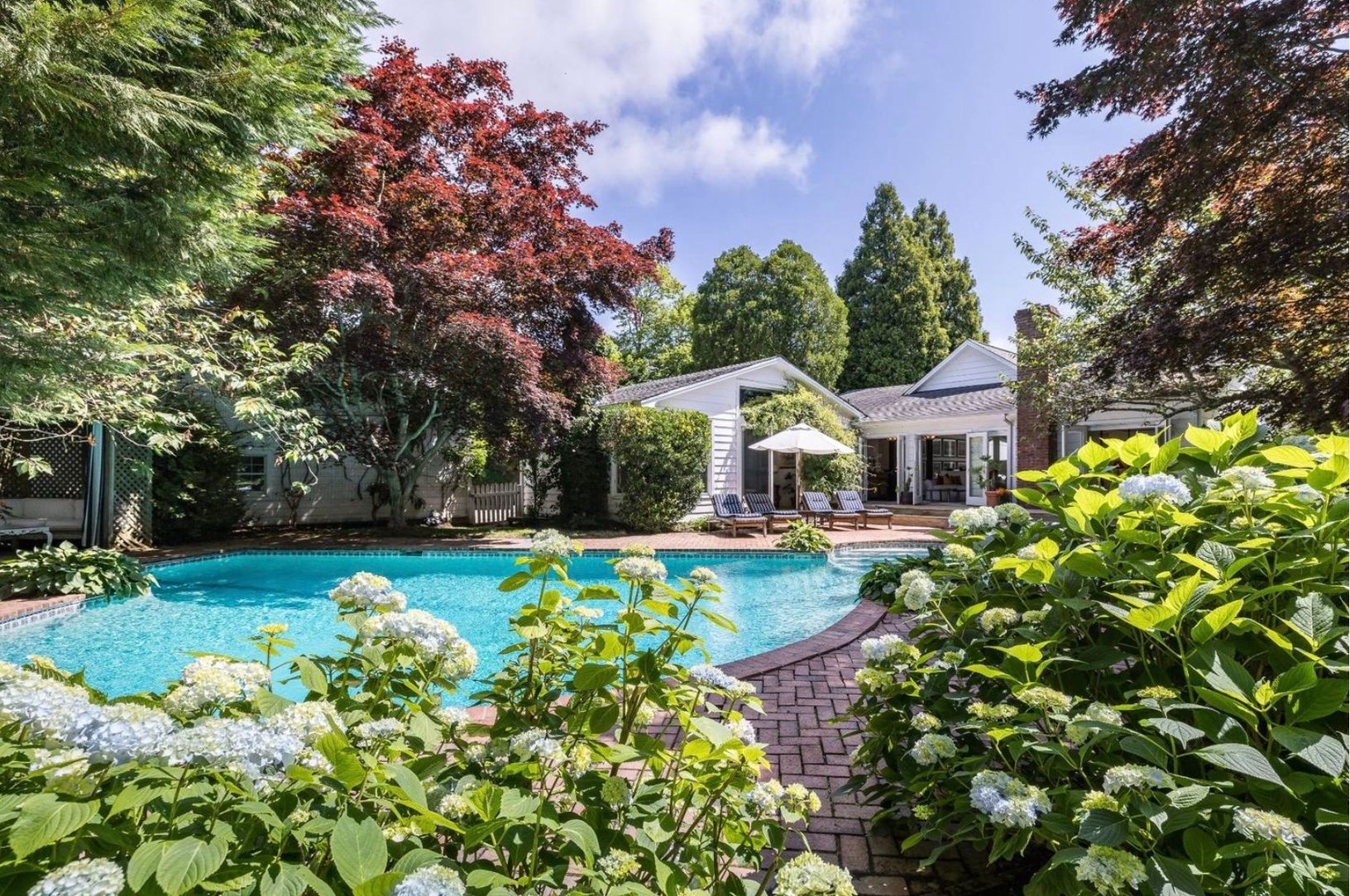  Enclosed pool area with lap pool, deep end for diving, shallow area for kids