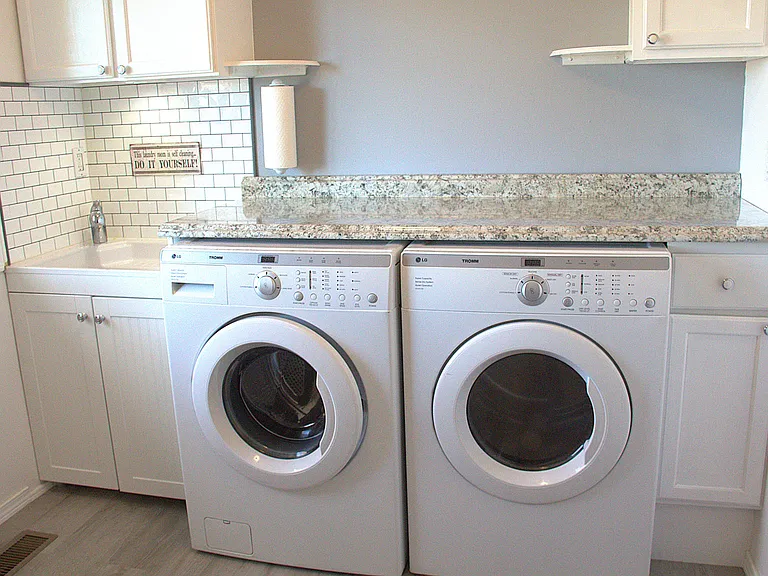 Deep sink and lots of storage in laundry room
