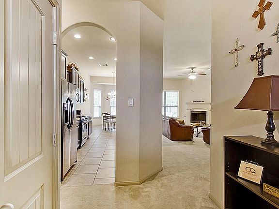 View from the foyer to the family friendly open floor plan.  Scheduled HVAC maintenance means this home feels as fresh as it looks!