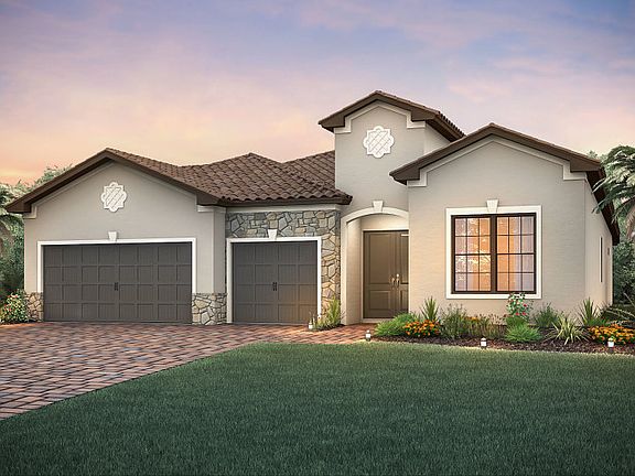 The Stonewater, a one-story family home with a 3 car garage, shown with Home Exterior FM3A