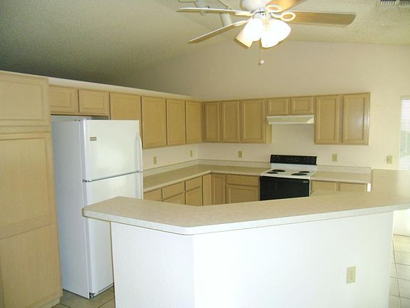 Huge Kitchen with Wrap-Around Breakfast Bar