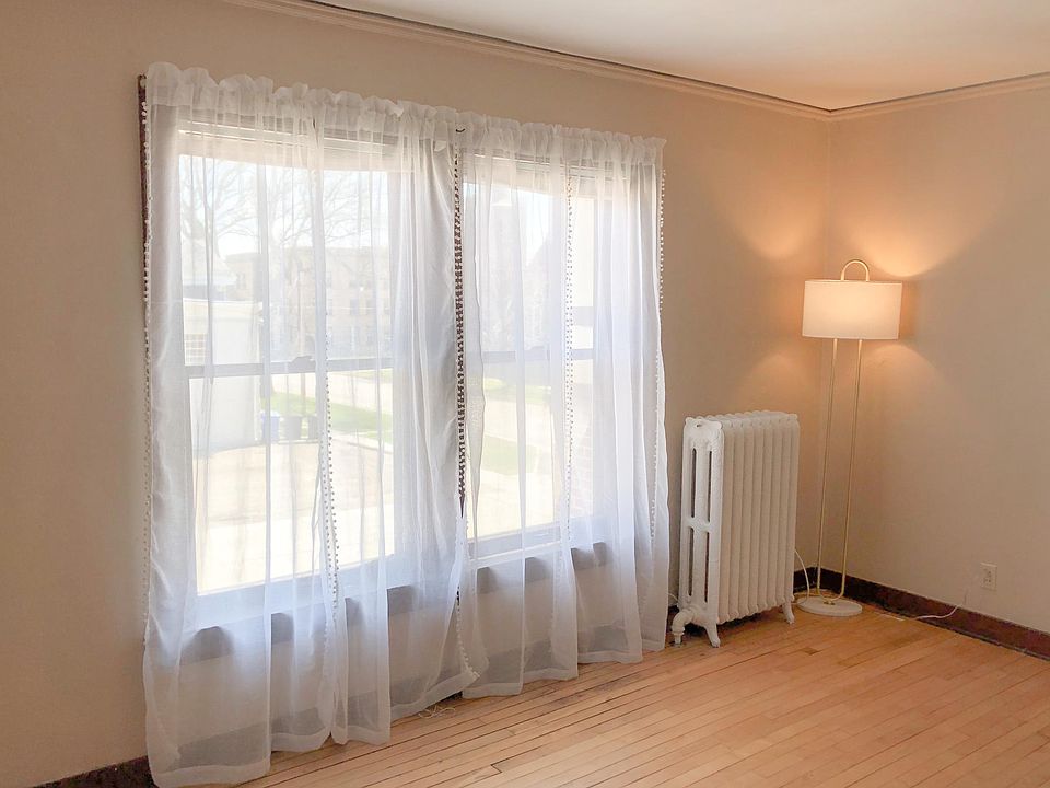 Lots of light brightens this space with large windows and tall ceilings.