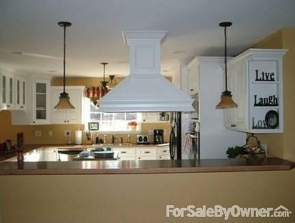 The Dream Kitchen (From the living room)
						:
						That is the hood I built with a Broan-NuTone Rangemaster (quite in-line blower)