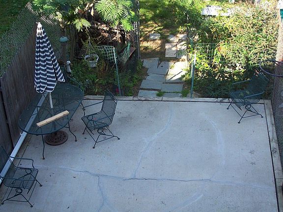 Private patio area in rear of home.