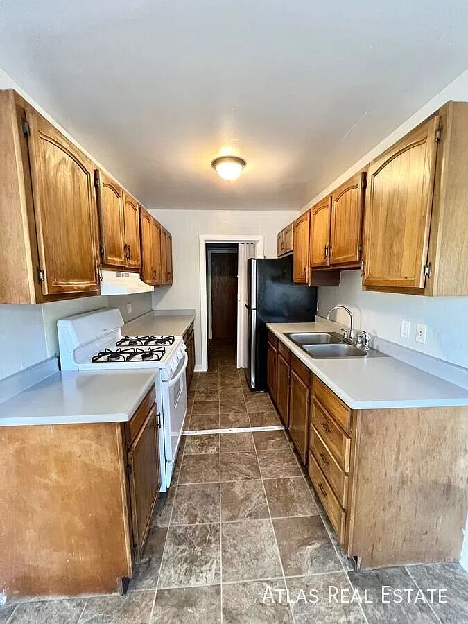 Charming 2-bedroom Home with Yard & Shared Garage! Available this November — Photo 1