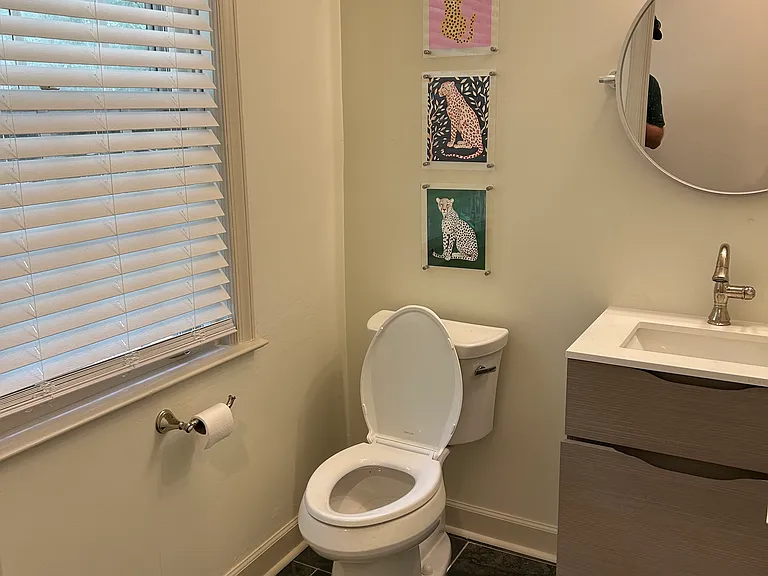 Half bath next to family room, laundry room, pantry and kitchen