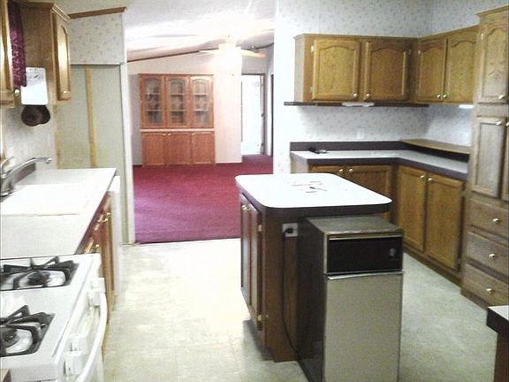Kitchen w island n dining rm