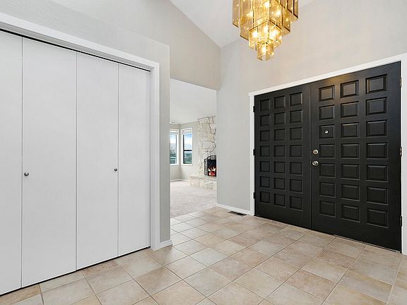 Spacious tiled entryway.