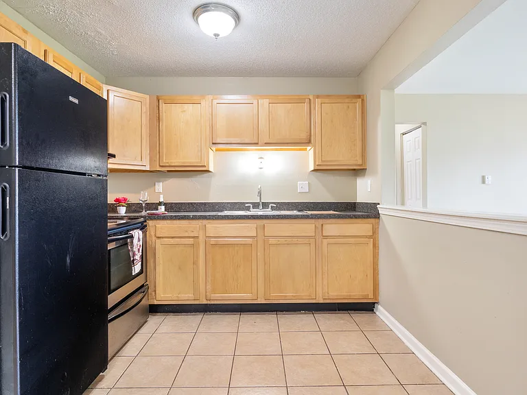 Miracle Manor Apartments — Photo 32