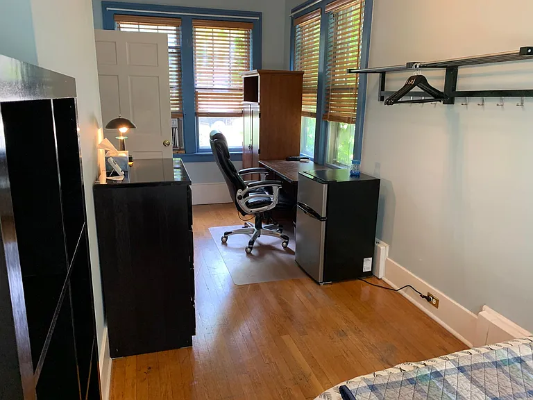1st floor - 8' x 20 east facing Sun-room bedroom with 8 full length windows and high quality wood blinds; glass topped dresser, personal LG Duueal inverter AC