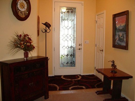 The canterwood has a wonderful greeting space with a leaded glass door and somewhere to hang your ha