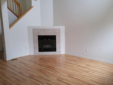 Sunny living room with gas fireplace