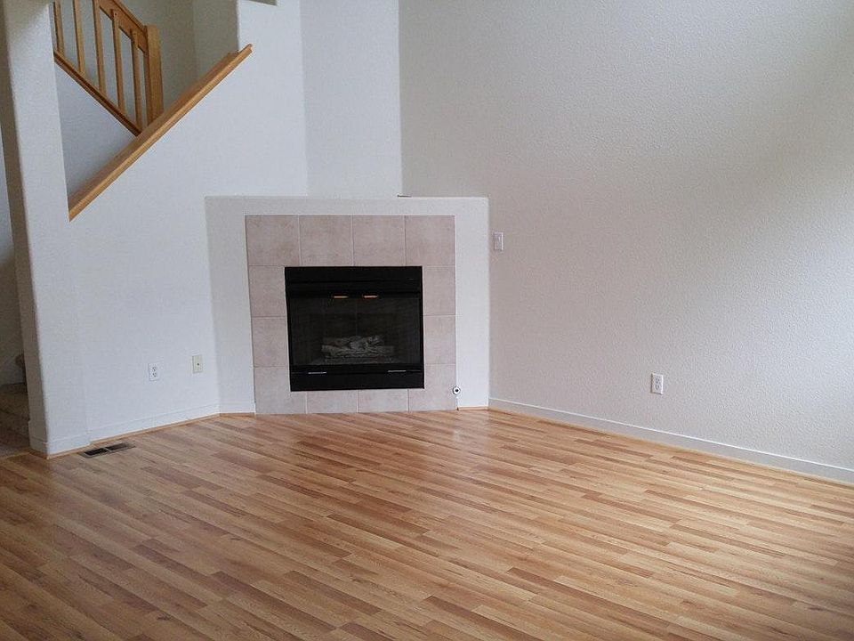 Sunny living room with gas fireplace