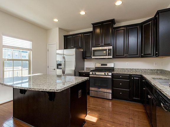 Large kitchen with stainless steel appliances