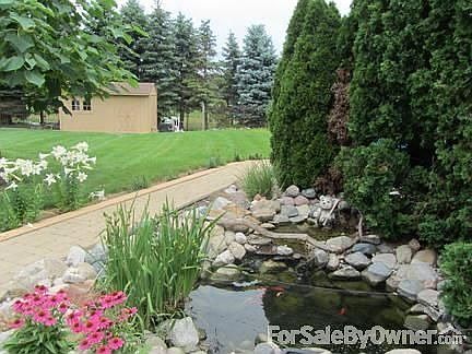 Fish pond with waterfall and stream