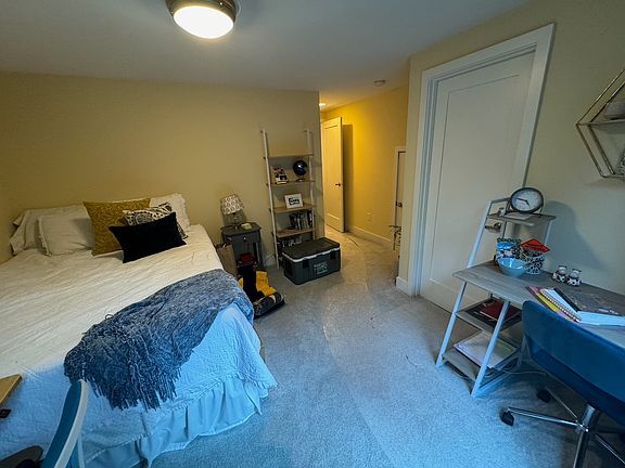 Door opens to bathroom with shower