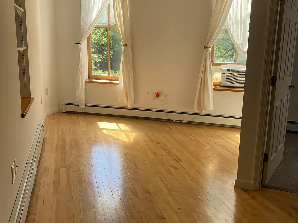 the a/c in this photo is not included in the apartment tenant is asked to purchase a/c unit and we no longer allow window units.