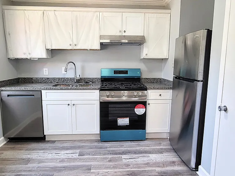 Stunning, fully remodeled white kitchen with brand-new stainless steel appliances