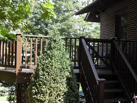 Retractable awning over deck