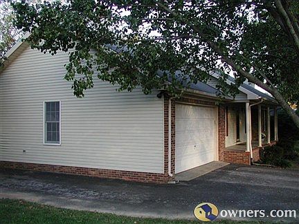 North side of house showing extra parking