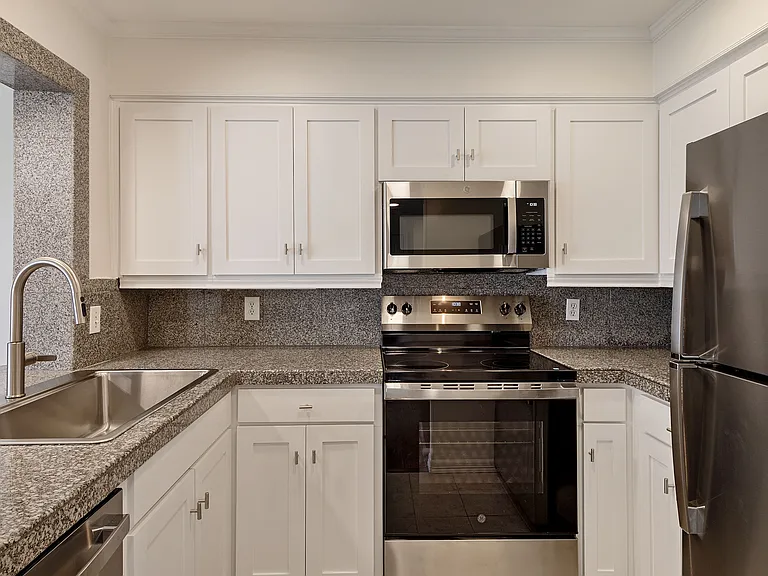 All new appliances, single tub sink, swan faucet, and cabinet doors and hardware.