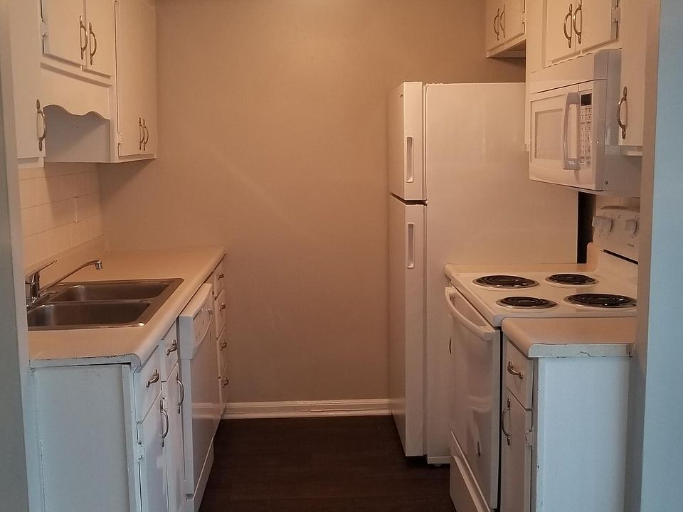 Kitchen- incliudes dishwasher, refrigerator, microwave, and 