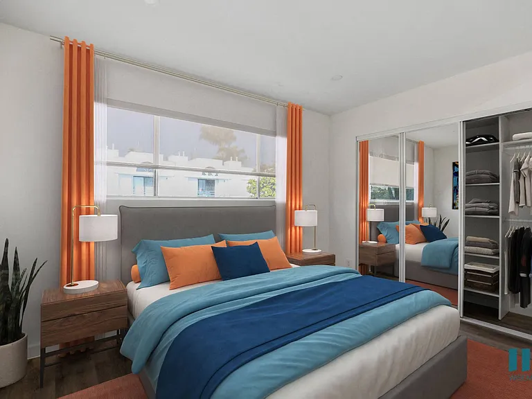 Bedroom with Vinyl Flooring and Large Mirrored Closet with Shelving