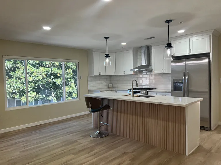 16463 Woodruff Ave — Photo 7