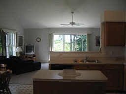 Kitchen opens to Family room, lots of room for lots of chefs! Tons of cabinetry, island, rull walk-in pantry, large eat space, fully applianced!
