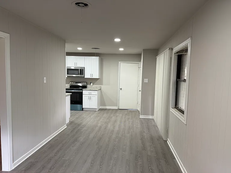 Dining Room is adjacent to Kitchen.