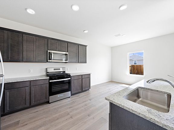 The kitchens have energy-efficient, stainless steel appliances.