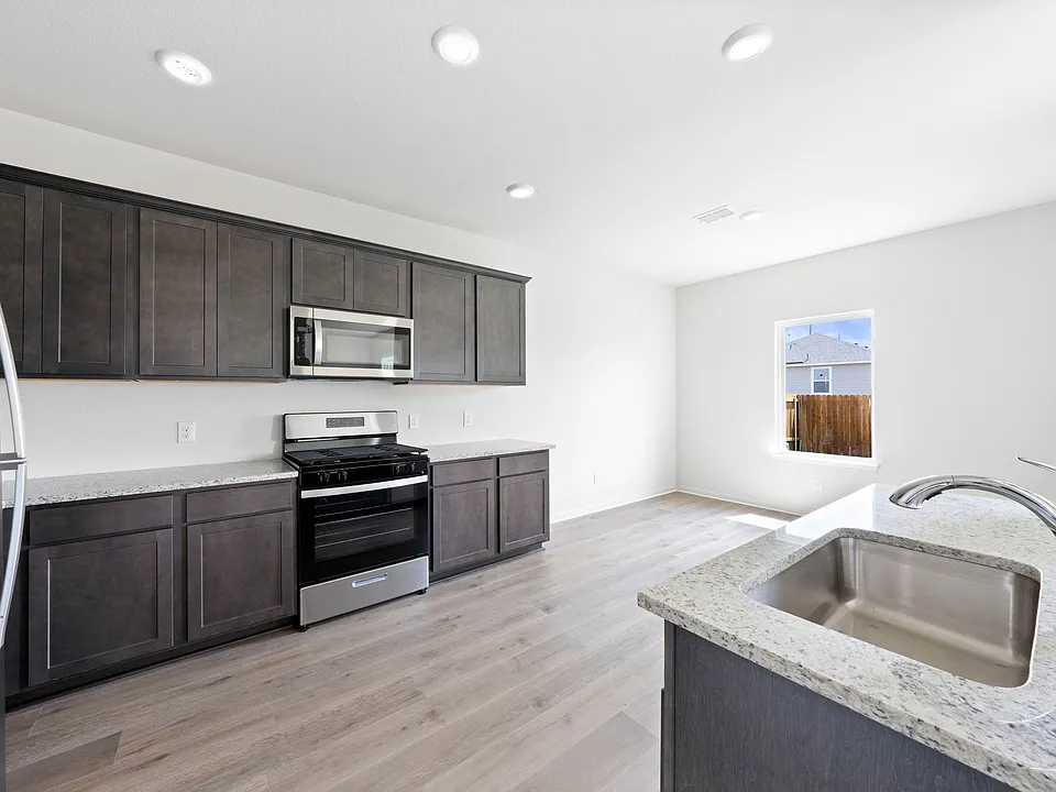 The kitchens have energy-efficient, stainless steel appliances.