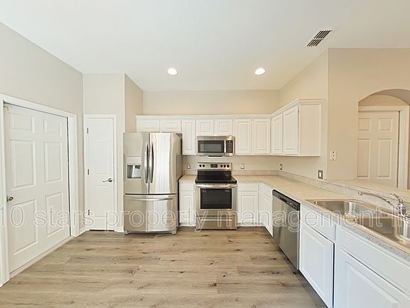 3rd image of 9828 Fan Palm Way #1