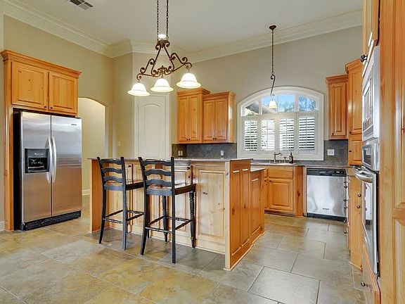 Kitchen opens to Living Room