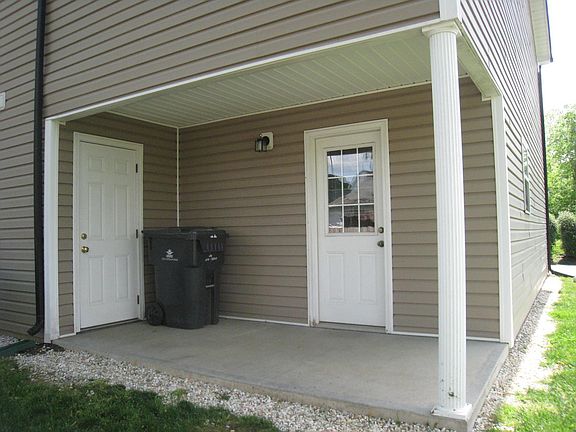 Great area to relax out back that has a large storage closet.