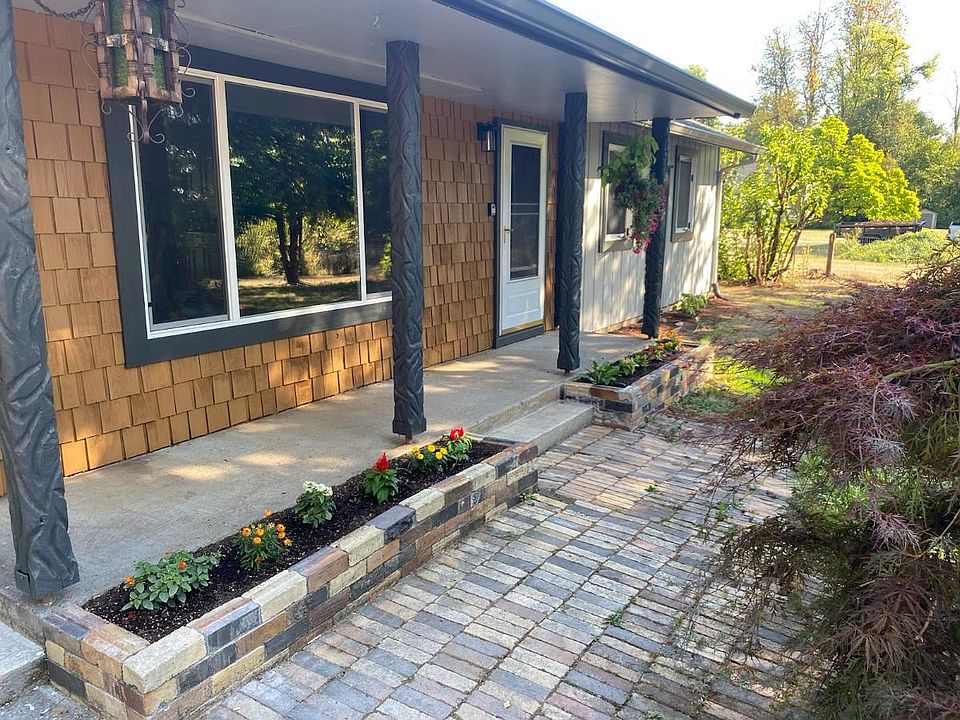 Front entry to the home with two planters