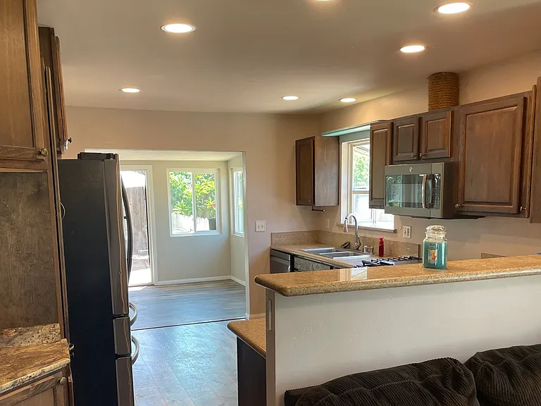 Facing kitchen from living room