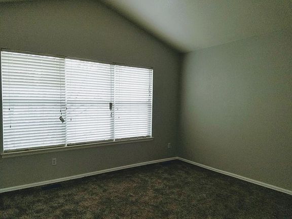Master Bedroom with Vaulted Ceiling