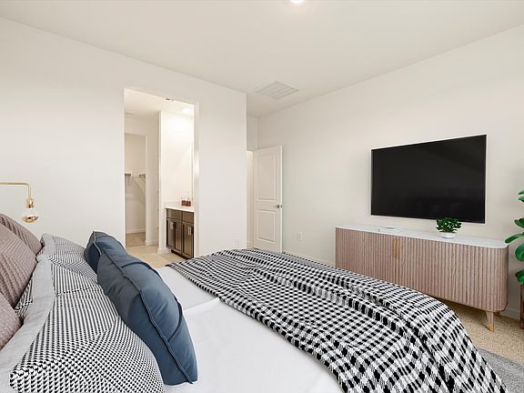 The Holly floorplan modeled at Rancho Mirage in Maricopa, AZ.