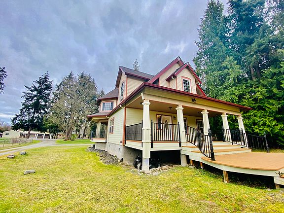 Home facing E with 1 front porch and a separate deck area